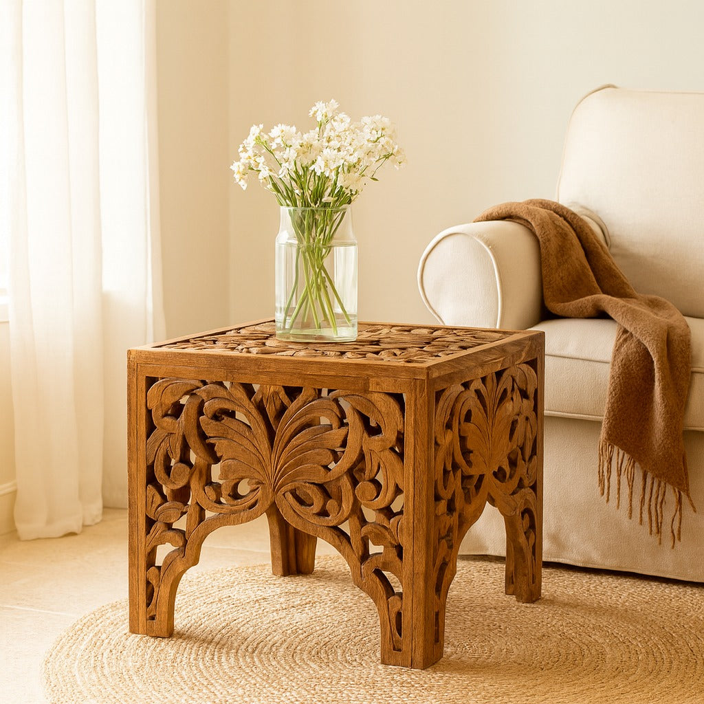 Wooden side table with floral arrangement in a living room setting