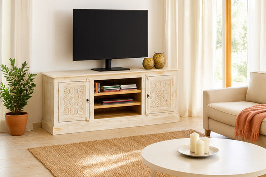 Living room with a wooden TV stand, television, and decorative items.