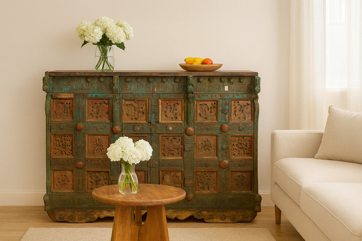 Vintage wooden cabinet with decorative patterns in a living room setting.
