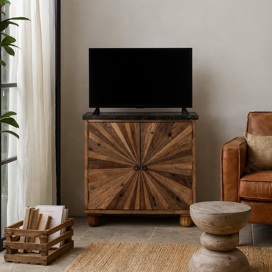 Wooden cabinet with a television on top in a living room setting.