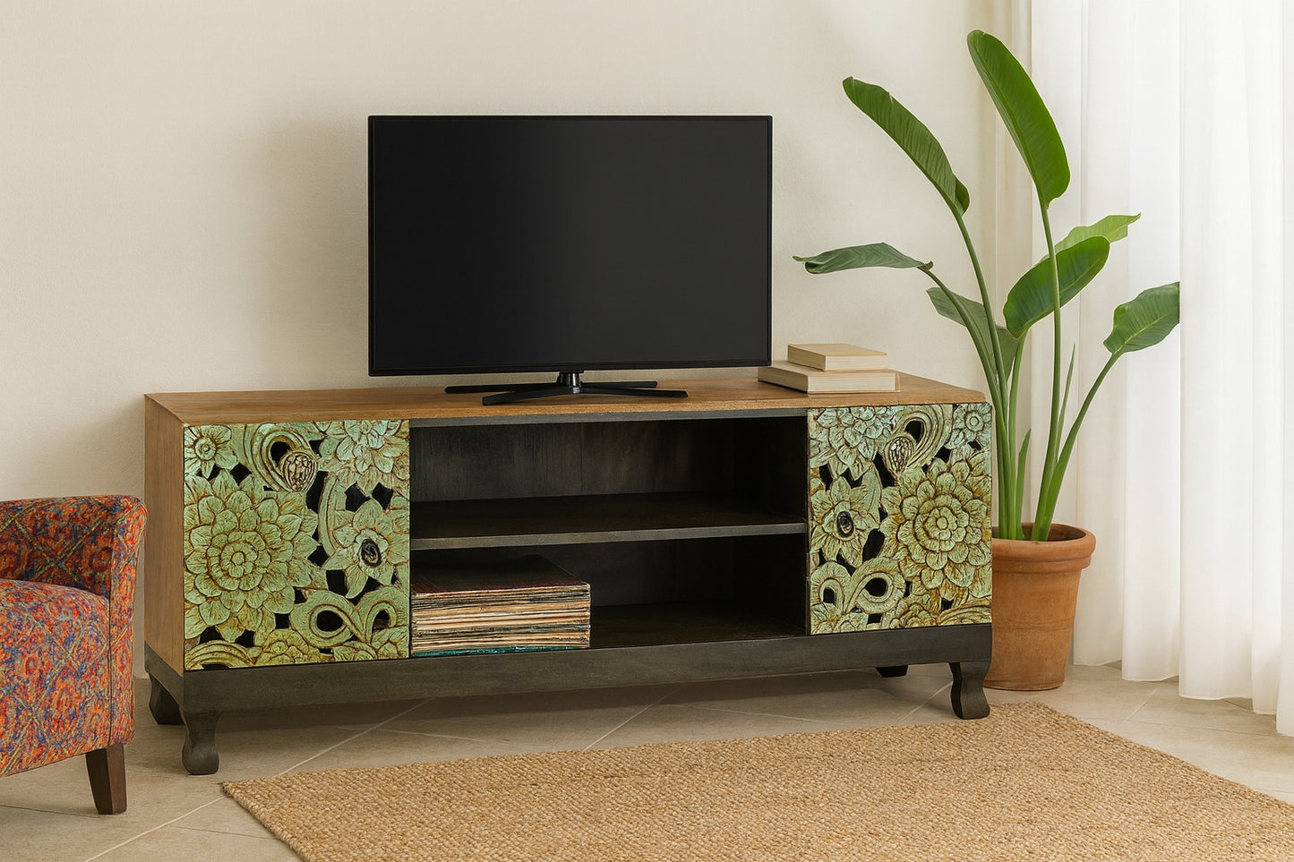 TV stand with decorative green panels in a living room setting
